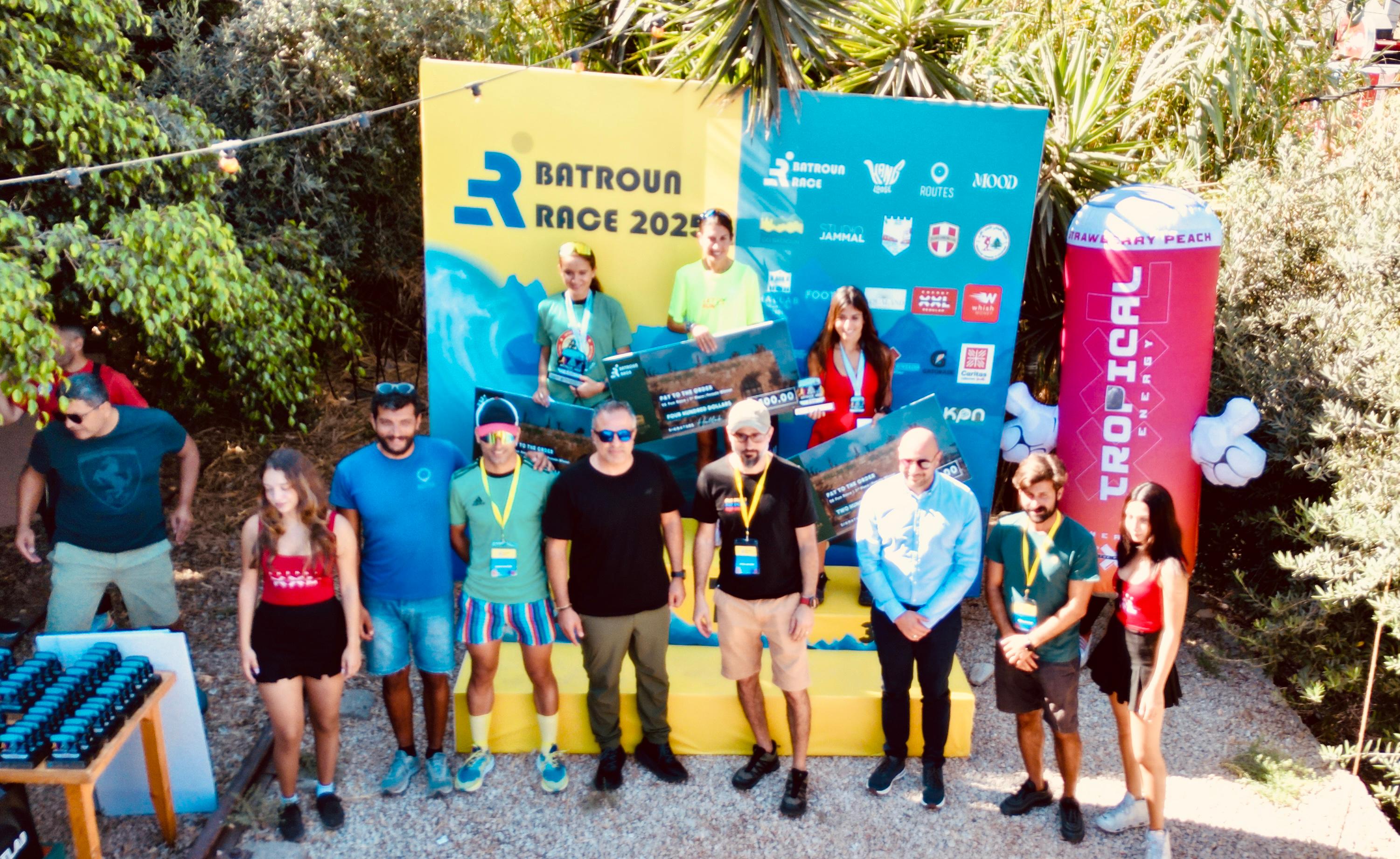 Participants and spectators gathered at an outdoor running race event in Batroun.
